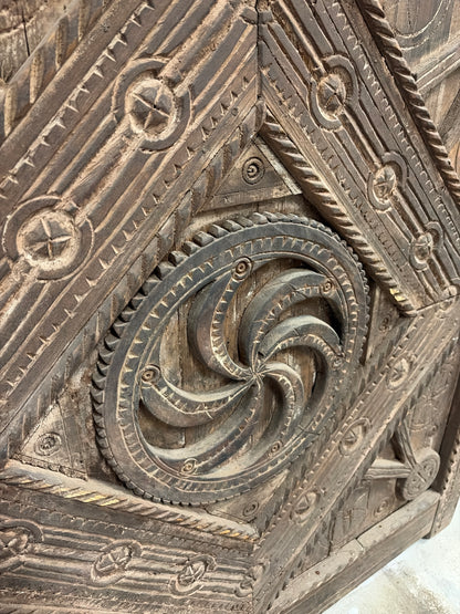 Morocco Medina Large Antique Hand-Carved Dark Wood Panel Door with Intricate Geometric Patterns and Central Rosette Motif