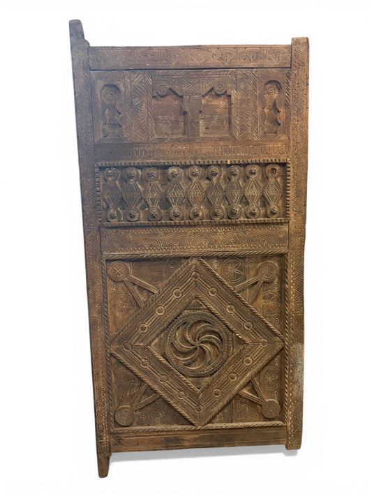 Morocco Medina Large Antique Hand-Carved Dark Wood Panel Door with Intricate Geometric Patterns and Central Rosette Motif